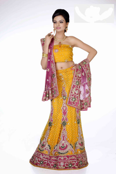 Attractive Yellow & Pink Color Net With Stone Work Bridal Lehenga Choli