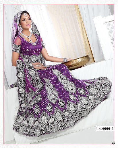 Purple net Lehenga choli with heavy stone wrok 