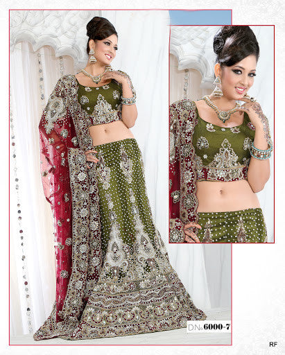 Mehendi green fish cut lehenga choli comes with heavy stone work