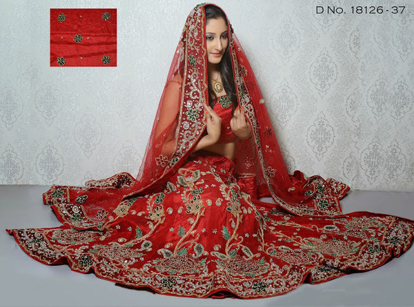 Attractive Red Color Net Heavy Stone Work Bridal Lehenga Choli