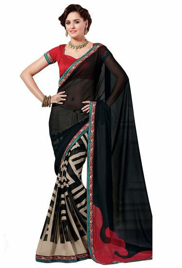 Defining royalty in its true senseOrange color saree crafted on Georgette - RAJSHRIFASHIONS